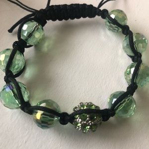 Green bracelet with tie